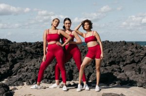 dk active models in red activewear